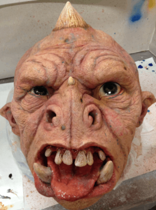Blank latex ogre mask airbrushed with acrylic