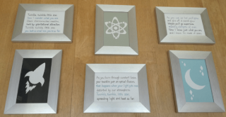 baby room decor of 6 framed space themed items: poem about stars and accompanying pictures
