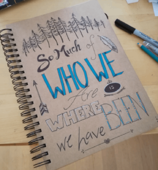 Hand lettered travel journal cover - so much of who we are is where we have been